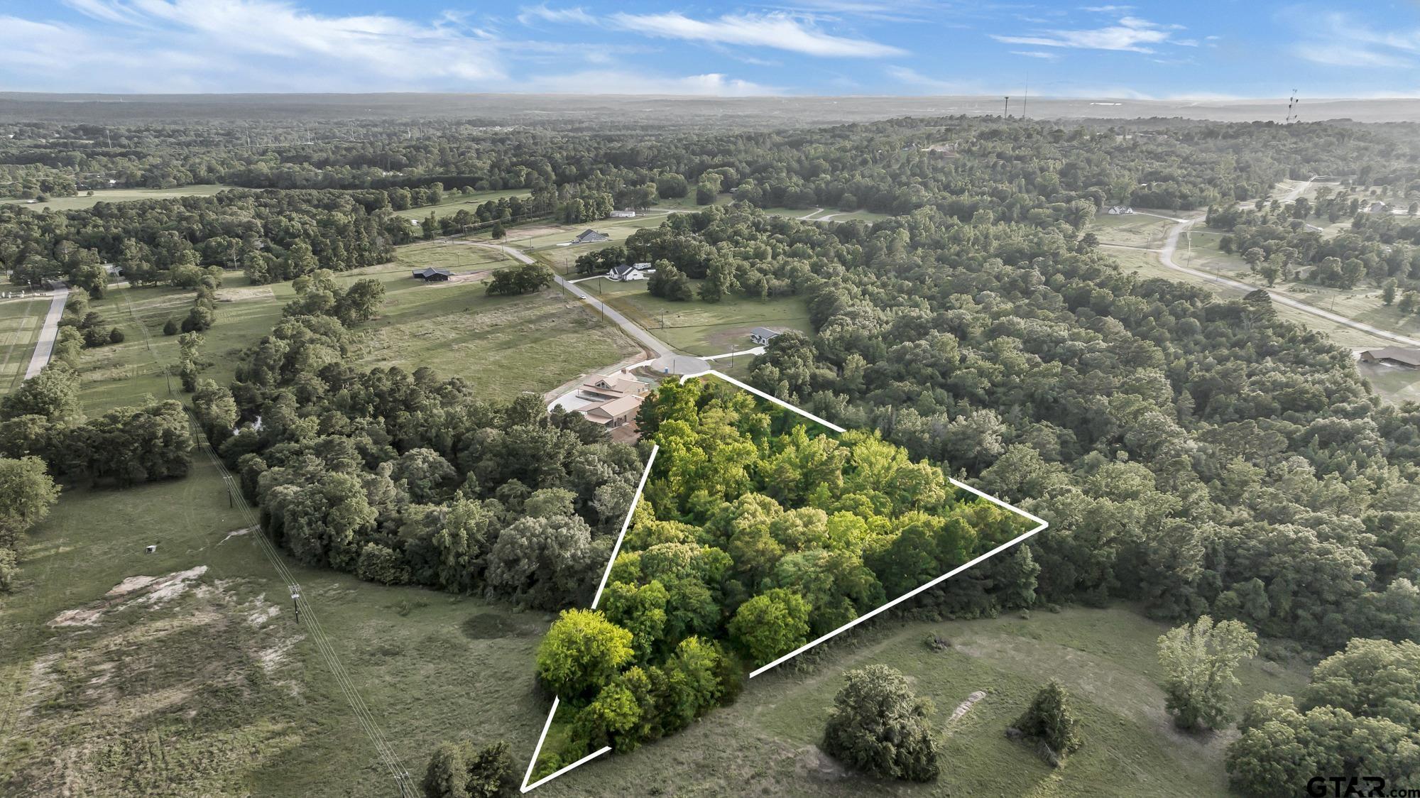 Lot 7 Ridgeway Court Winona, TX 75792 - Photo 2 of 7 an aerial view of a house with a yard