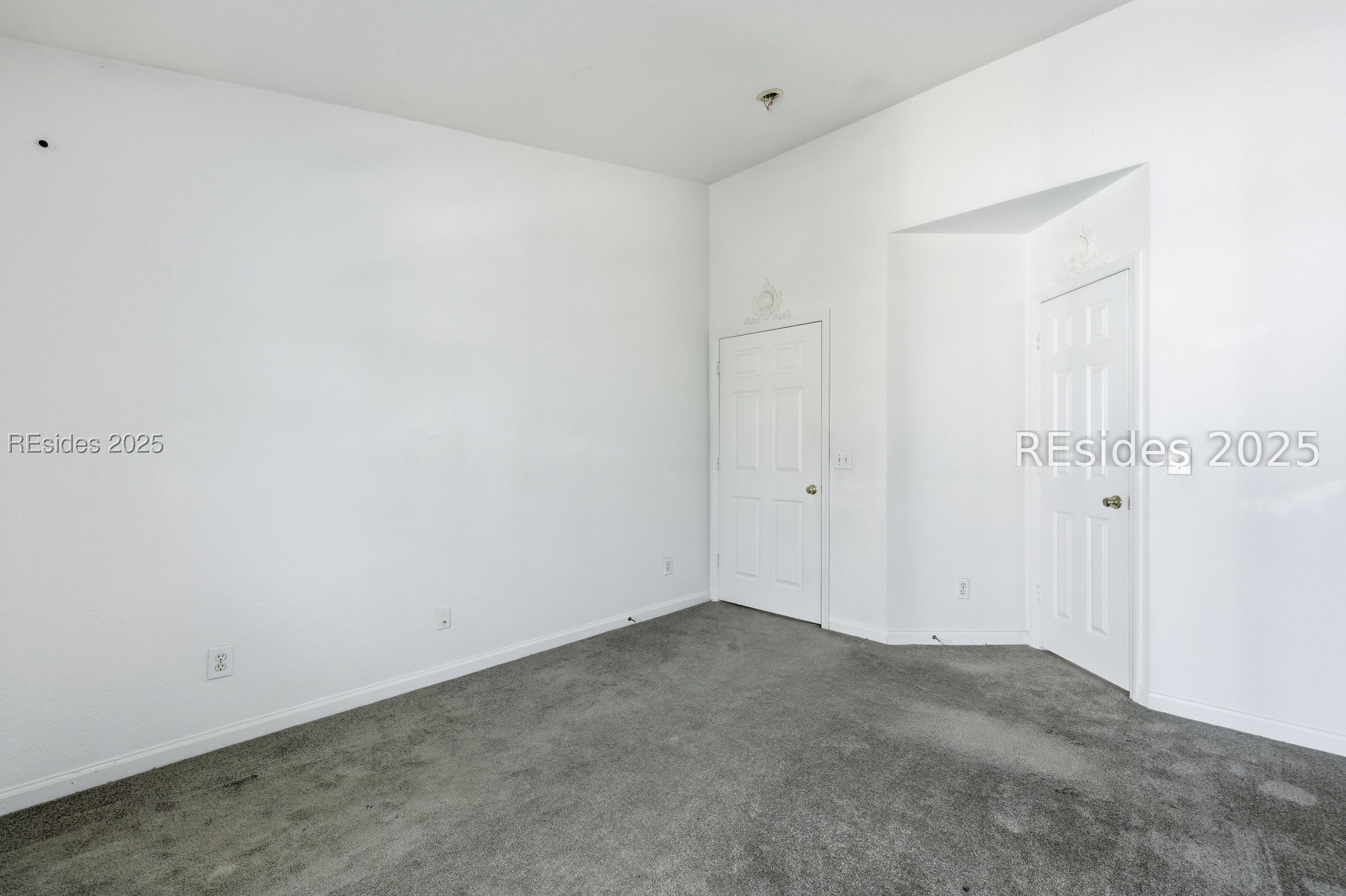 897 Fording Island Road, Unit 2810 Bluffton, SC 29910 - Photo 24 of 37 Bedroom door and closet door.