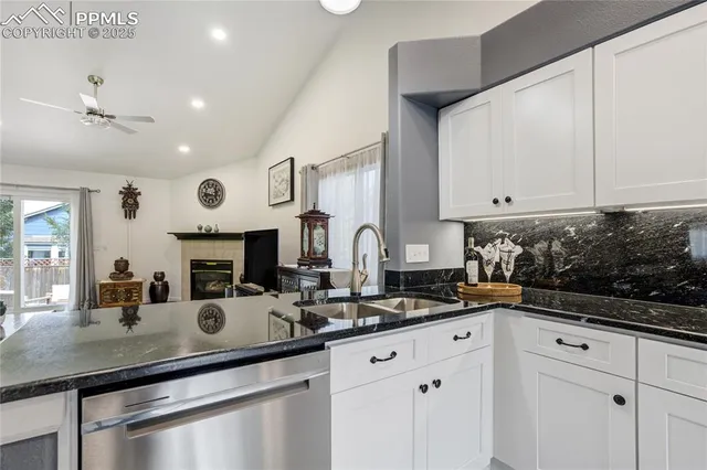 a kitchen with lots of counter space and a sink