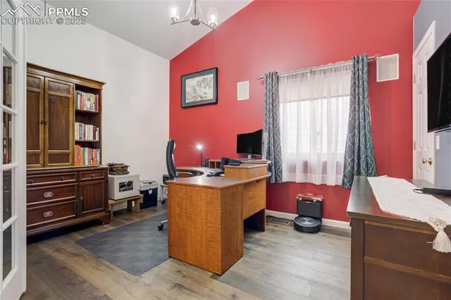 a bed room with a bed and a window