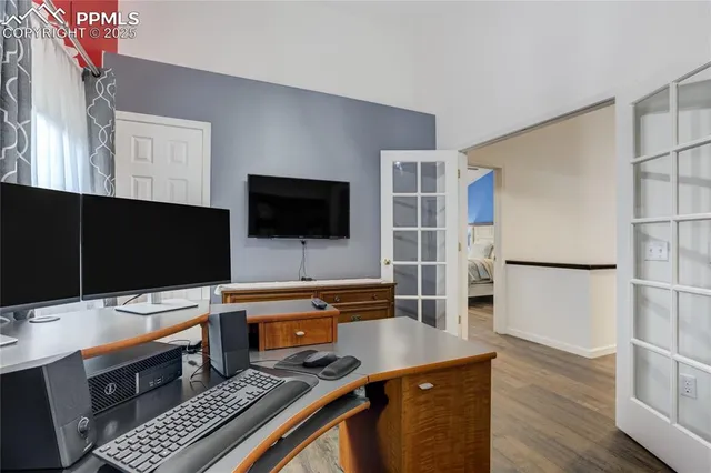 a room with furniture and a flat screen tv