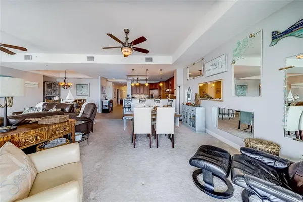 a large room with a lot of cabinets and wooden floor