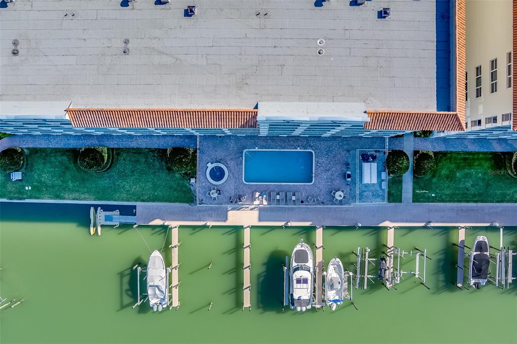 17745 Gulf Boulevard, Unit 303 Redington Shores, FL 33708 - Photo 77 of 83 a aerial view of a house with a yard table and chairs