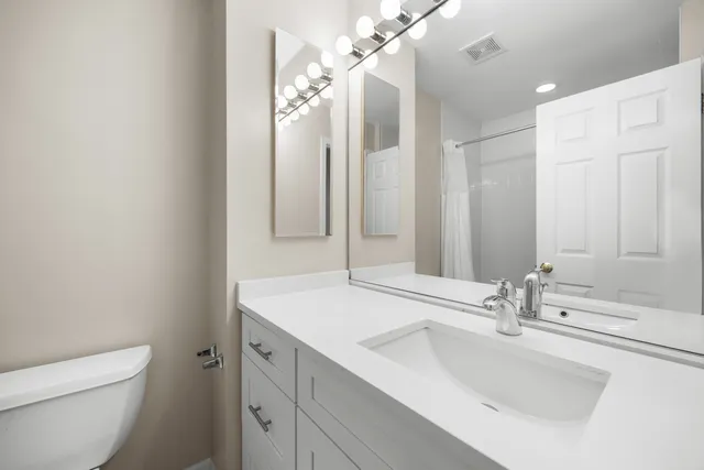 a bathroom with a sink and a toilet