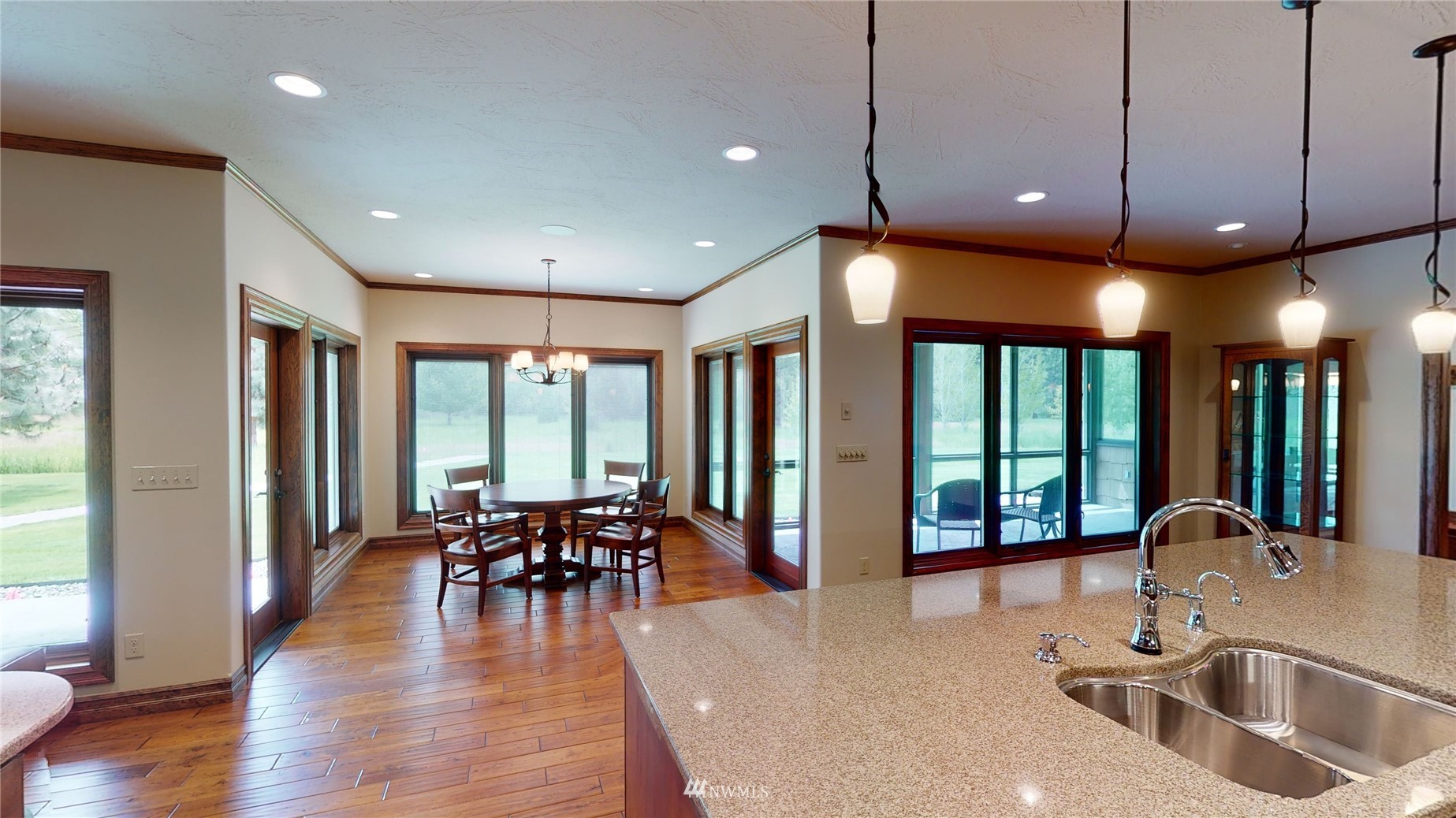 1948 Tucannon Road Pomeroy, WA 99347 - Photo 8 of 40 a view of a dining room with furniture window and wooden floor