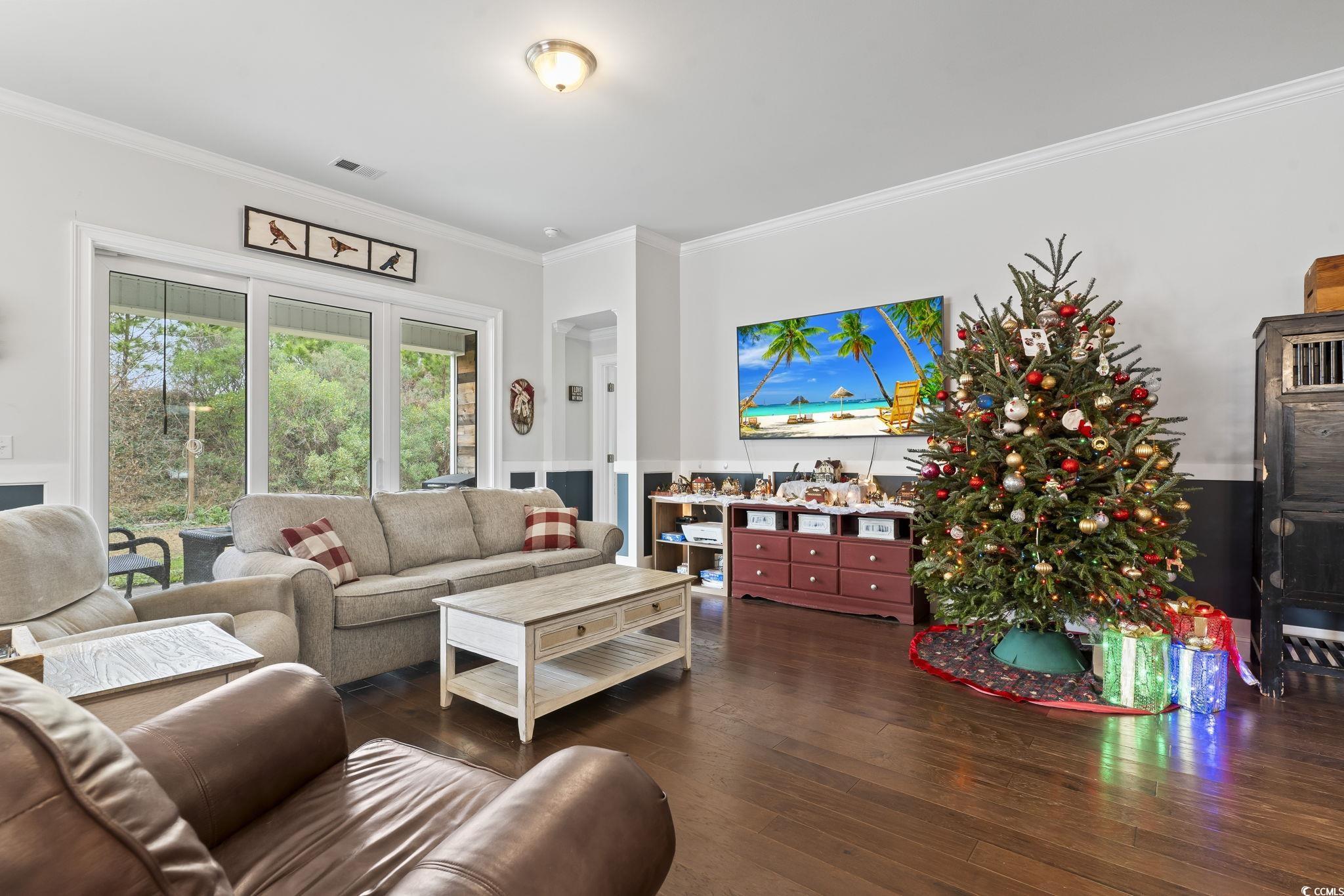 144 Bucky Loop Murrells Inlet, SC 29576 - Photo 20 of 40 Living room featuring dark hardwood / wood-style f