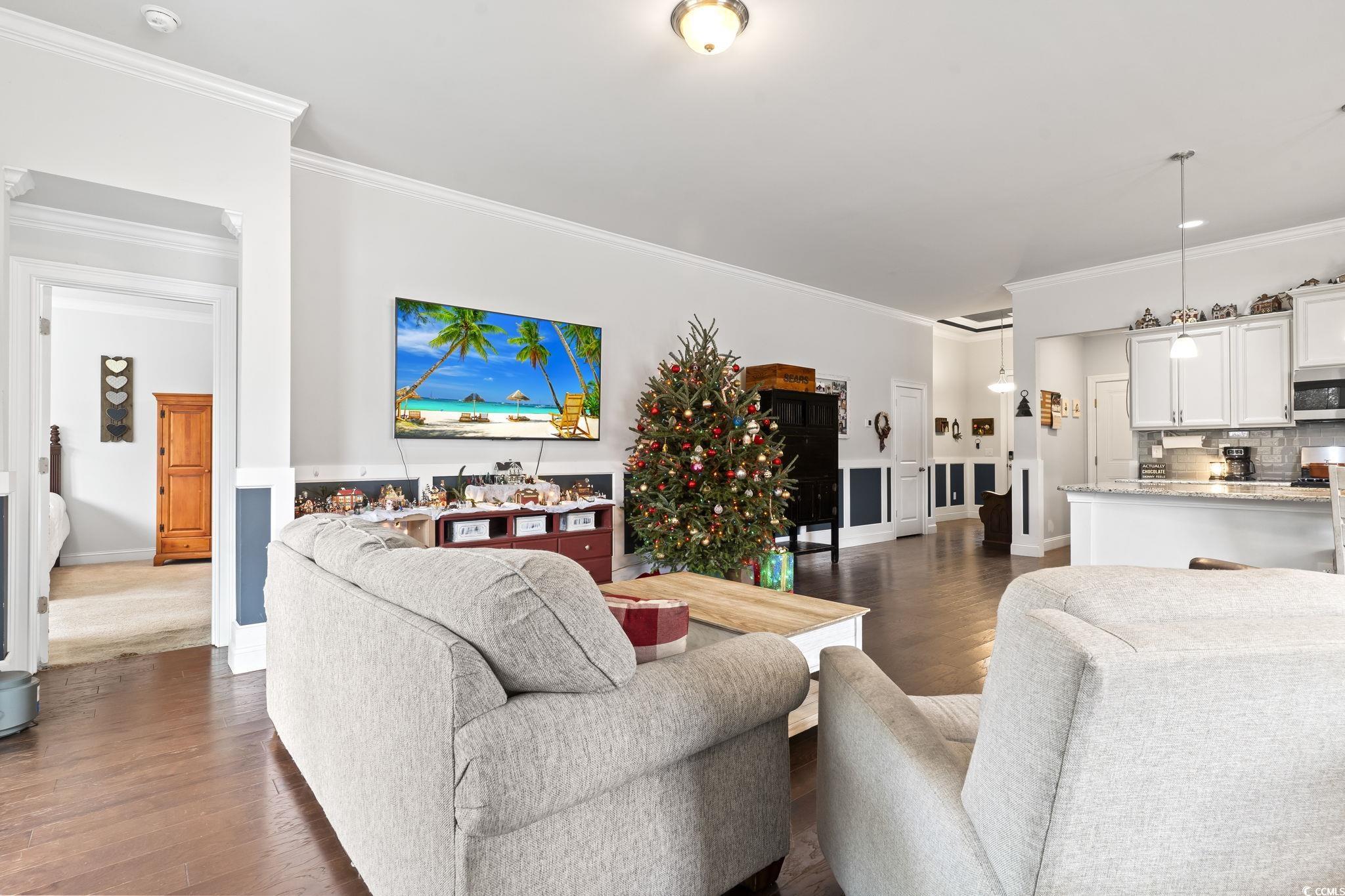 144 Bucky Loop Murrells Inlet, SC 29576 - Photo 22 of 40 Living room featuring dark hardwood / wood-style f