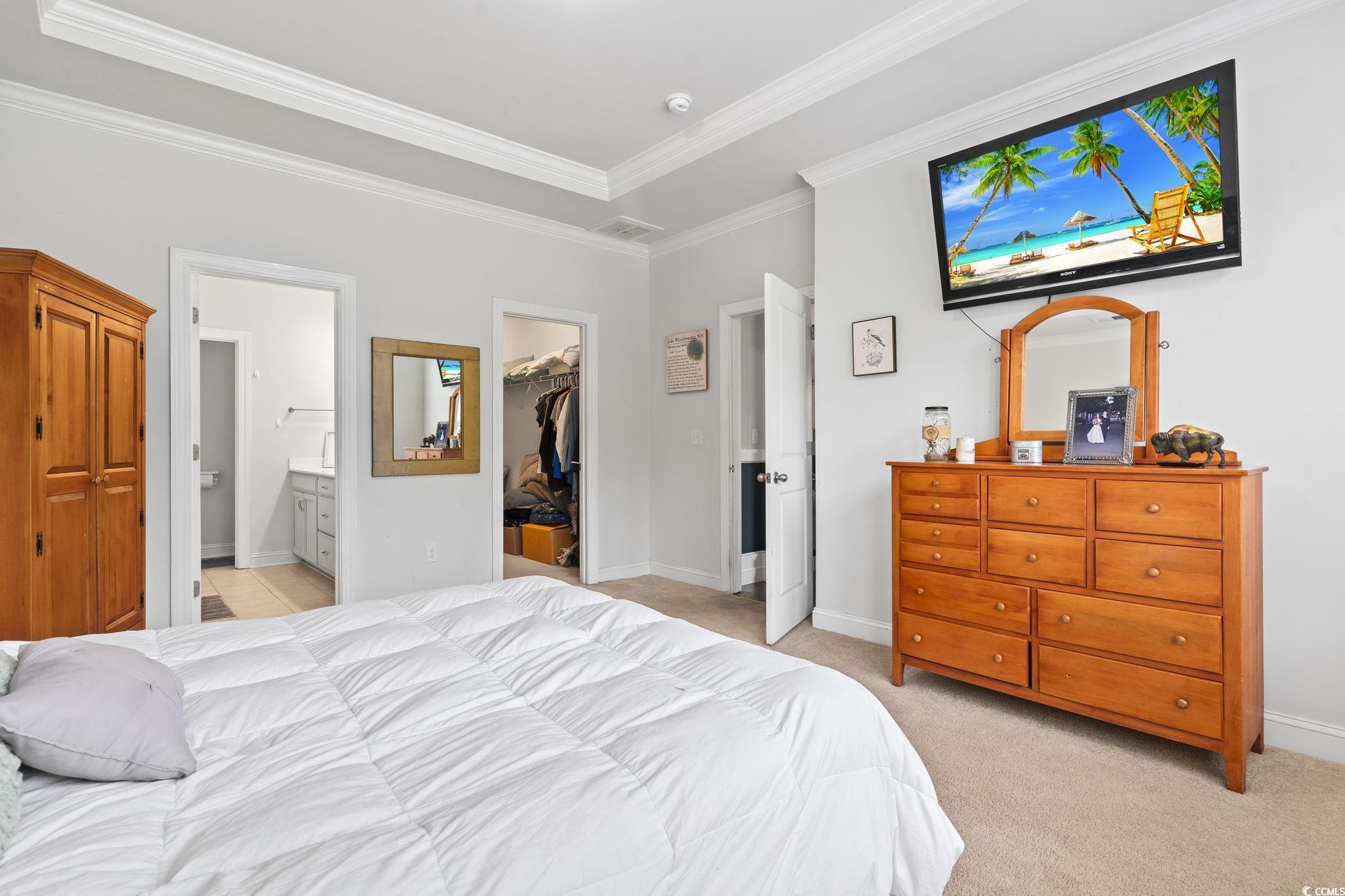 144 Bucky Loop Murrells Inlet, SC 29576 - Photo 24 of 40 Bedroom featuring light carpet, ensuite bathroom,