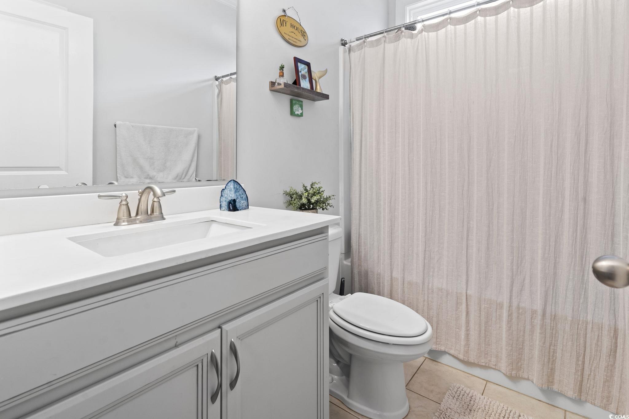 144 Bucky Loop Murrells Inlet, SC 29576 - Photo 31 of 40 Full bathroom with tile patterned flooring, vanity