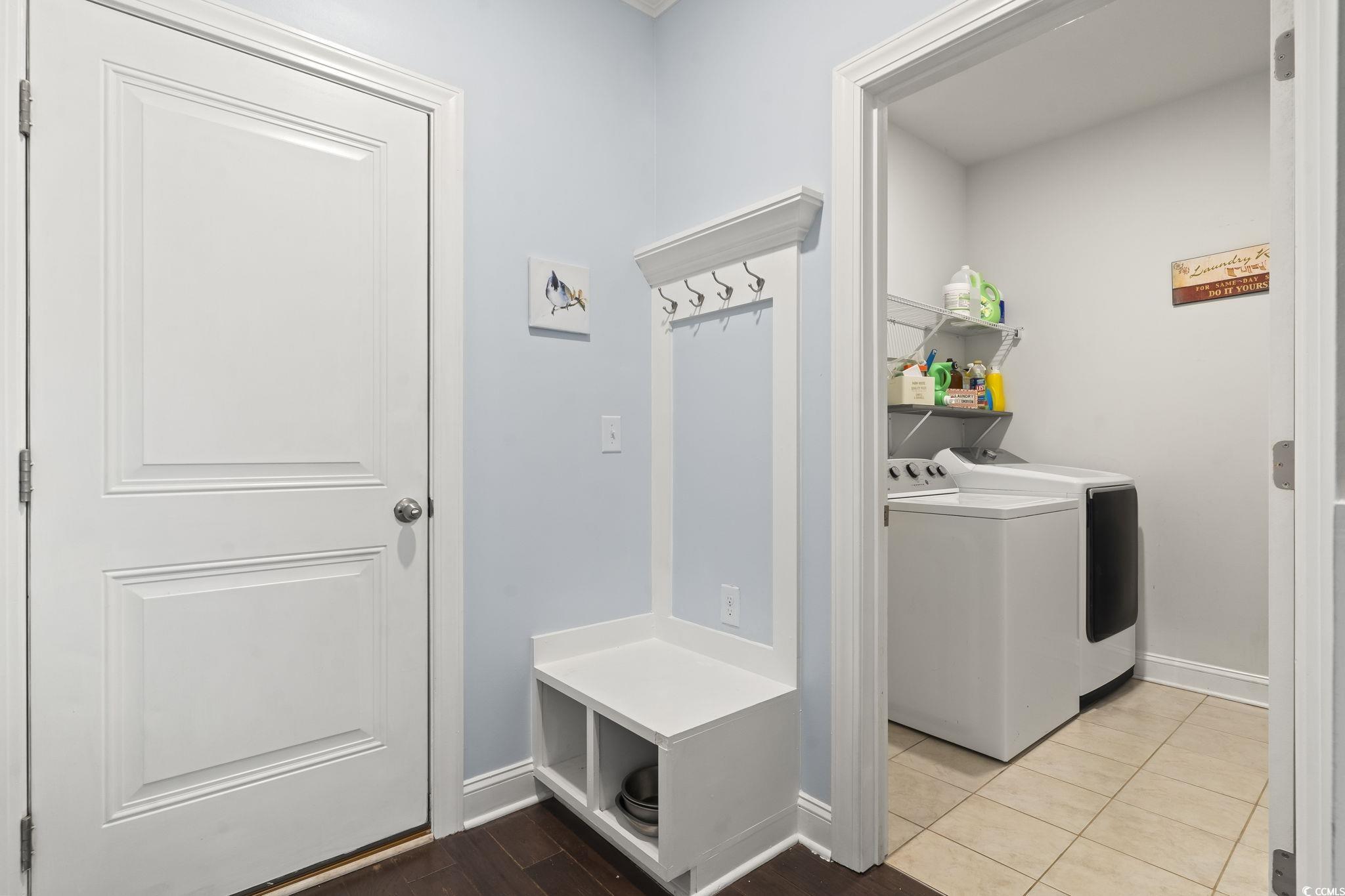 144 Bucky Loop Murrells Inlet, SC 29576 - Photo 33 of 40 Clothes washing area featuring light tile patterne