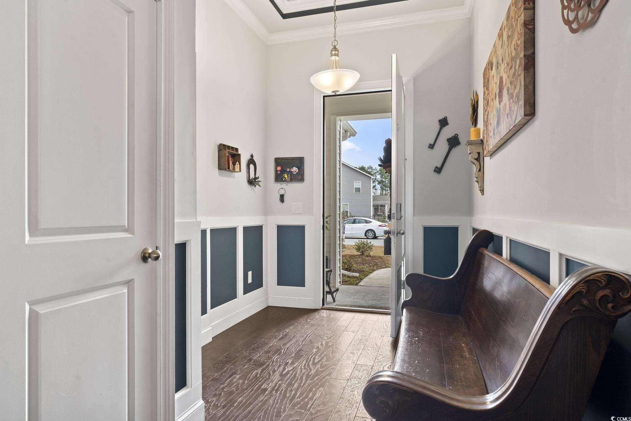 144 Bucky Loop Murrells Inlet, SC 29576 - Photo 7 of 40 Interior space with dark hardwood / wood-style flo