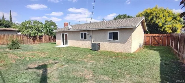 a house view with a garden space