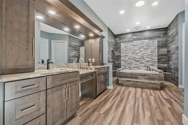 a living room with a bed and a table