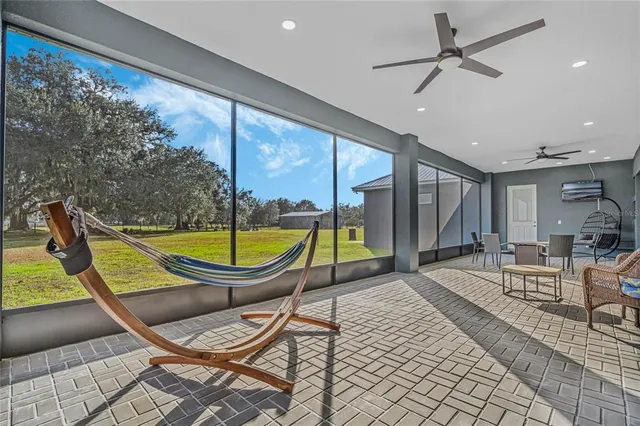 a view of a park with sitting area