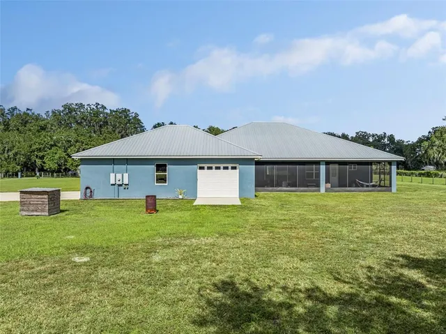 a backyard of a house with lots of green space