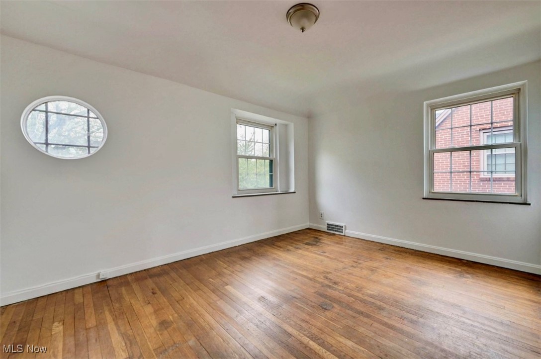 3693 Warren Road Cleveland, OH 44111 - Photo 21 of 37 Bed room featuring light wood-style flooring and baseboards