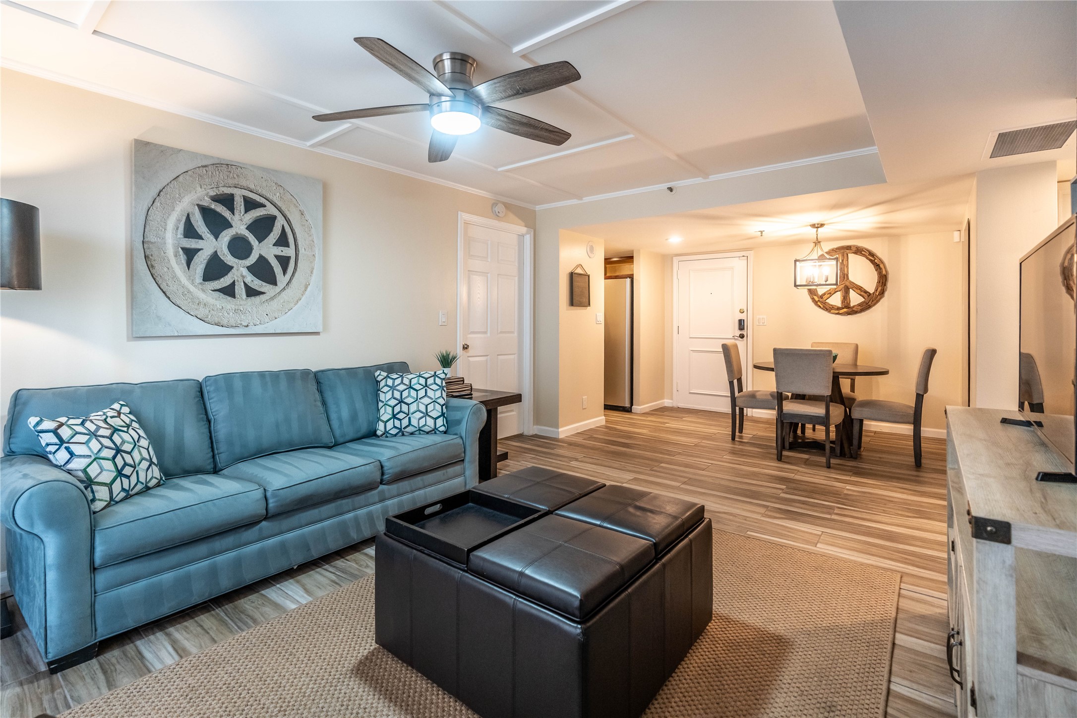 3525 Sage Road, Unit 913 Houston, TX 77056 - Photo 1 of 22 a living room with furniture and wooden floor