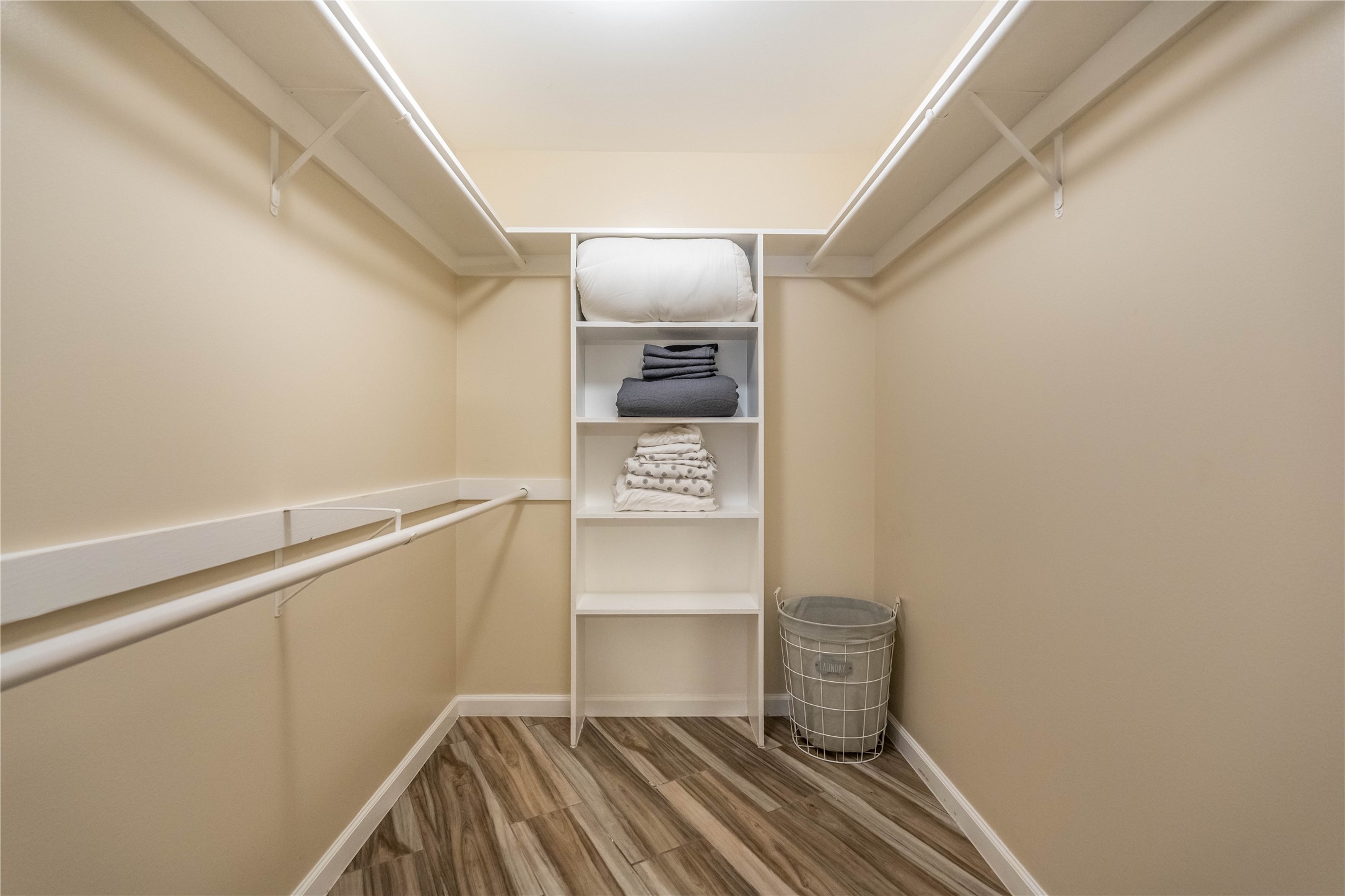 3525 Sage Road, Unit 913 Houston, TX 77056 - Photo 11 of 22 a view of storage and utility room with racks on the wall