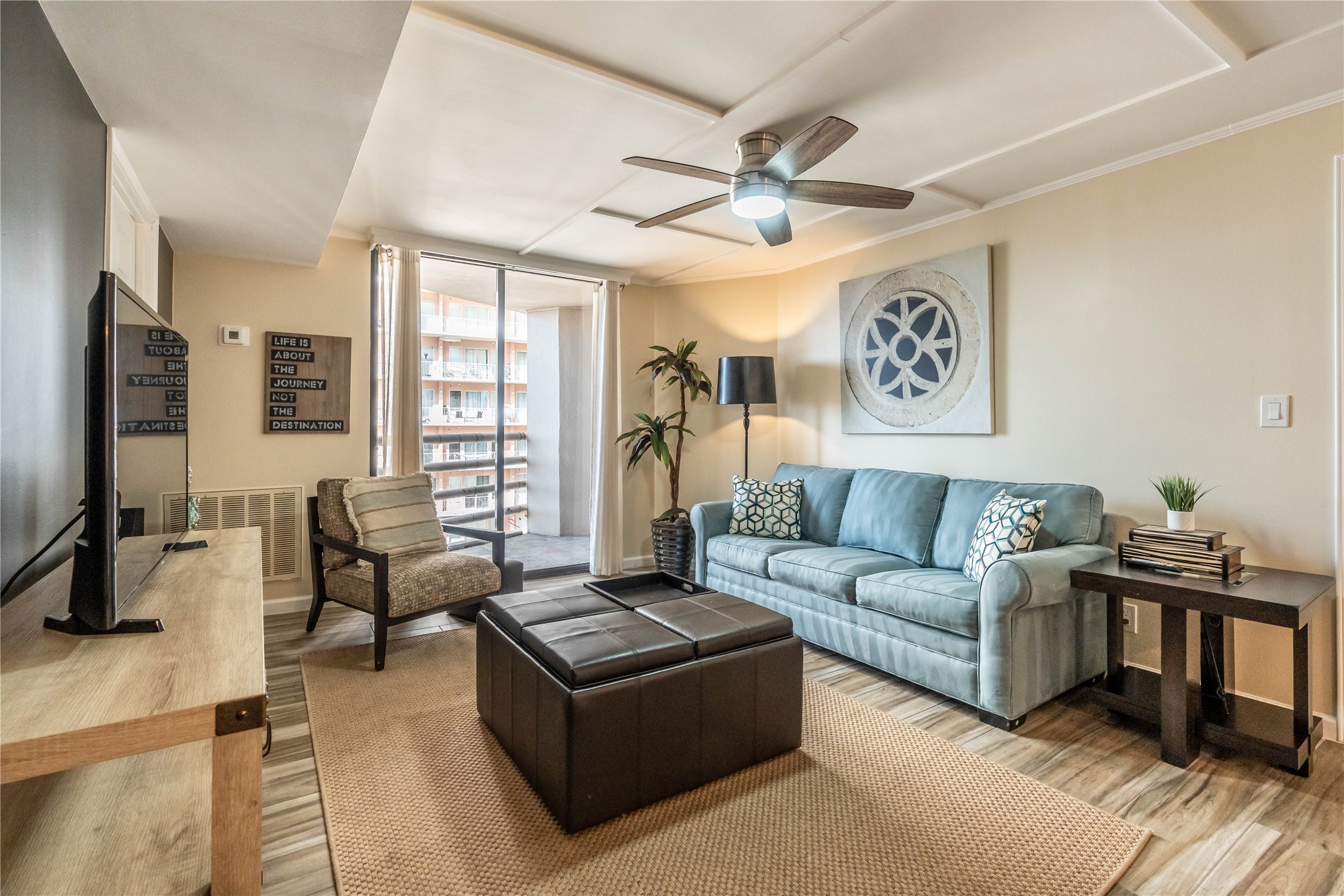 3525 Sage Road, Unit 913 Houston, TX 77056 - Photo 2 of 22 a living room with furniture and a large window