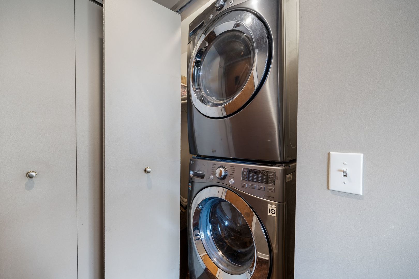 2222 North Racine Avenue, Unit 12 Chicago, IL 60614 - Photo 17 of 37 a utility room with dryer and washer