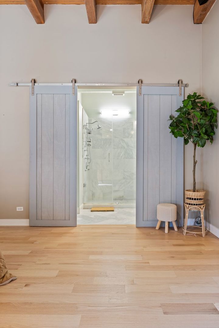 2222 North Racine Avenue, Unit 12 Chicago, IL 60614 - Photo 21 of 37 a view of a room with a table and chair