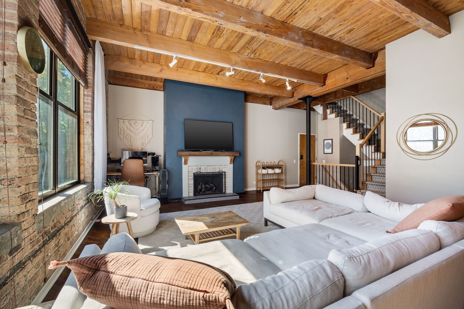 2222 North Racine Avenue, Unit 12 Chicago, IL 60614 - Photo 7 of 37 a living room with furniture a fireplace and a flat screen tv