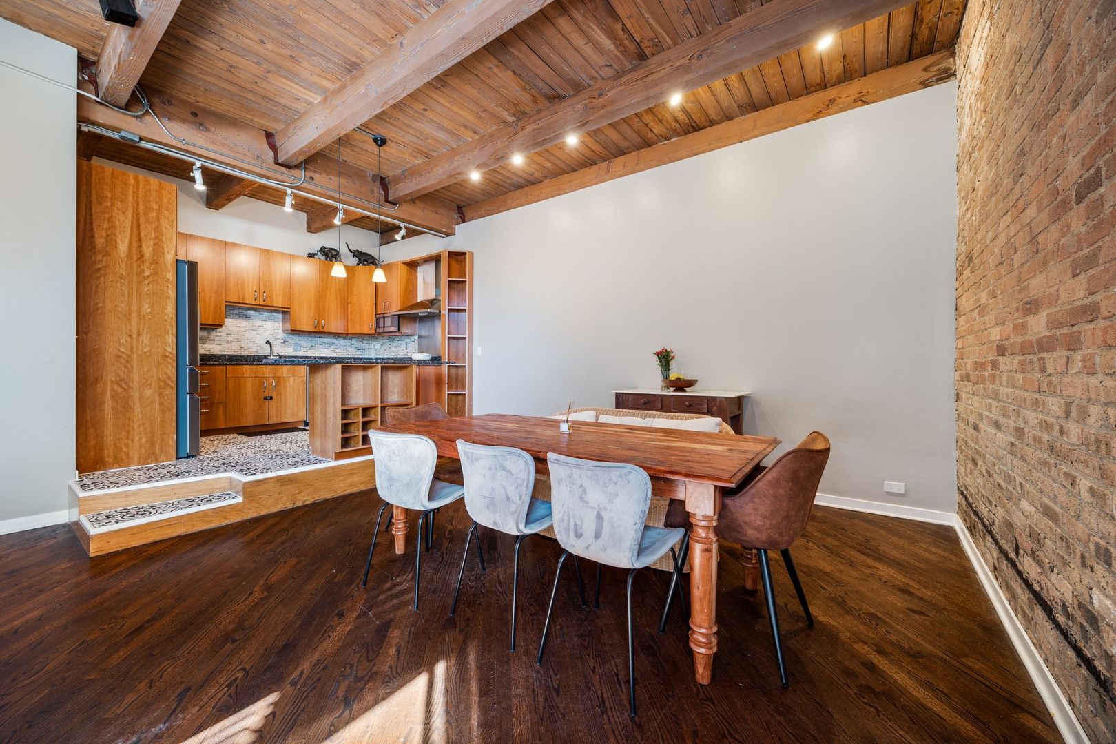 2222 North Racine Avenue, Unit 12 Chicago, IL 60614 - Photo 9 of 37 a dining room with furniture and wooden floor