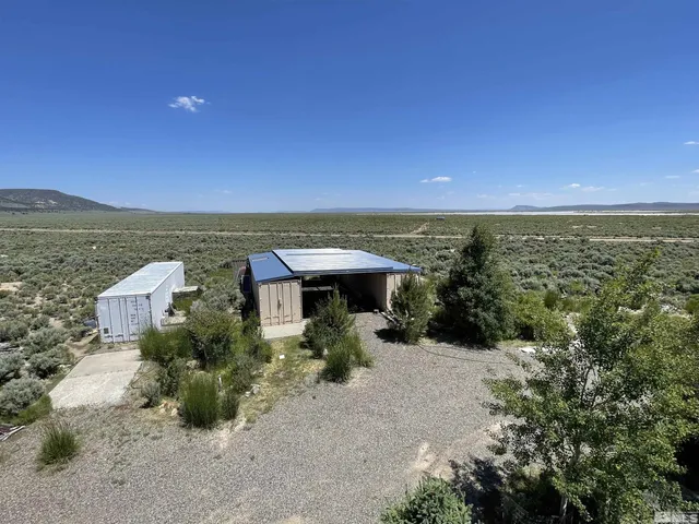 a kitchen with stainless steel appliances granite countertop a sink and a stove