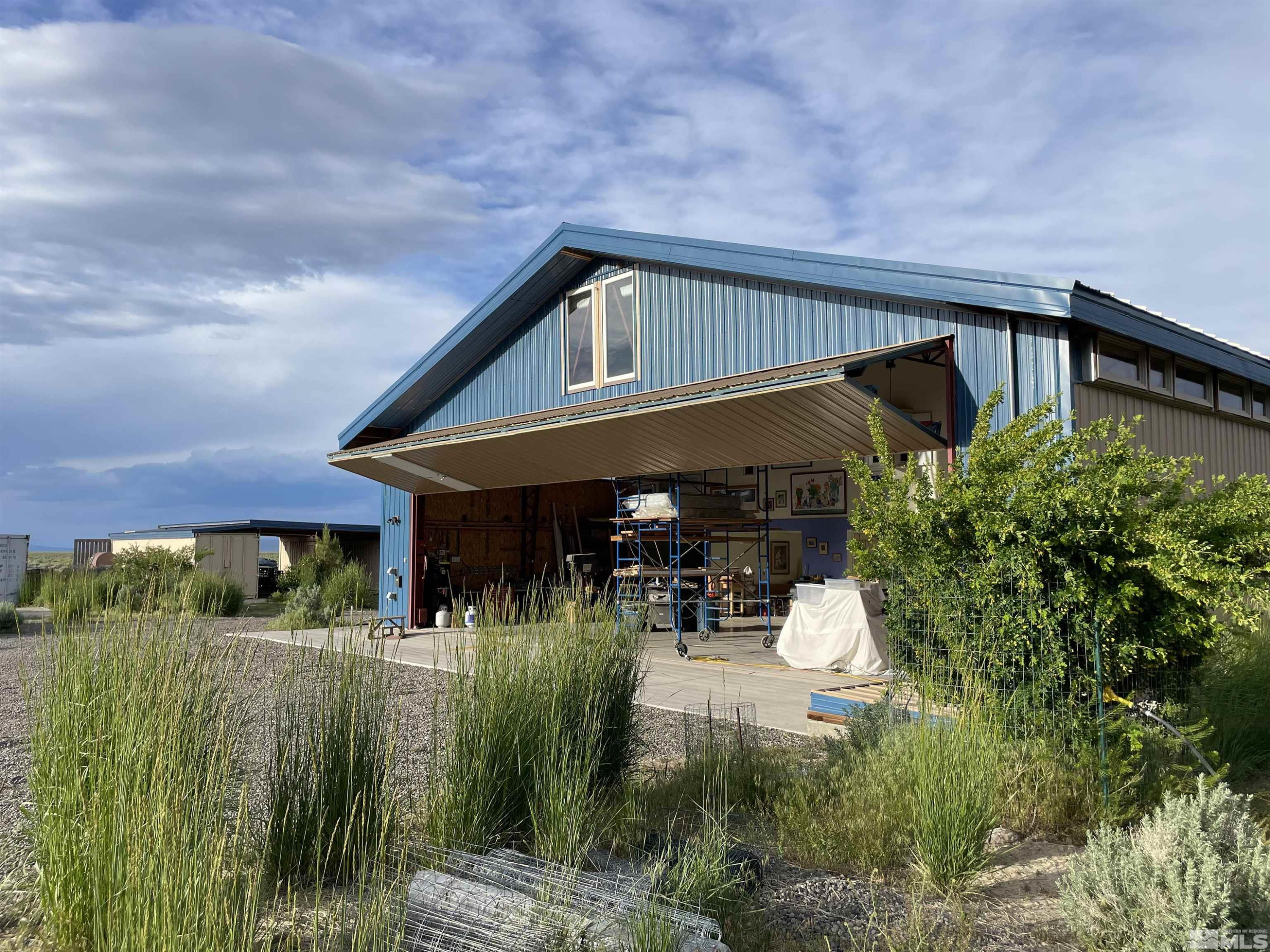 93205 State Route 34 Gerlach, NV 89412 - Photo 17 of 70 a front view of a house with a yard