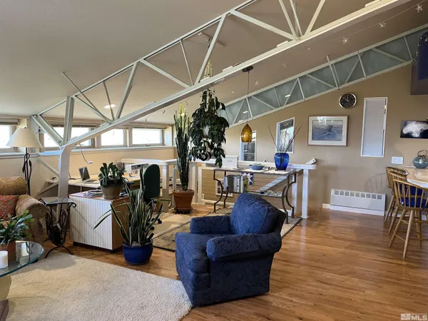 a kitchen with a refrigerator and a sink
