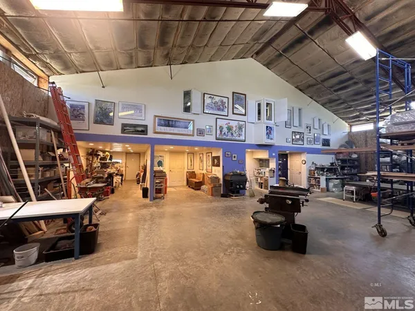 an aerial view of a house with a outdoor space