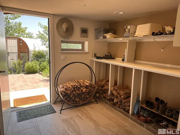 a kitchen with cabinets and window