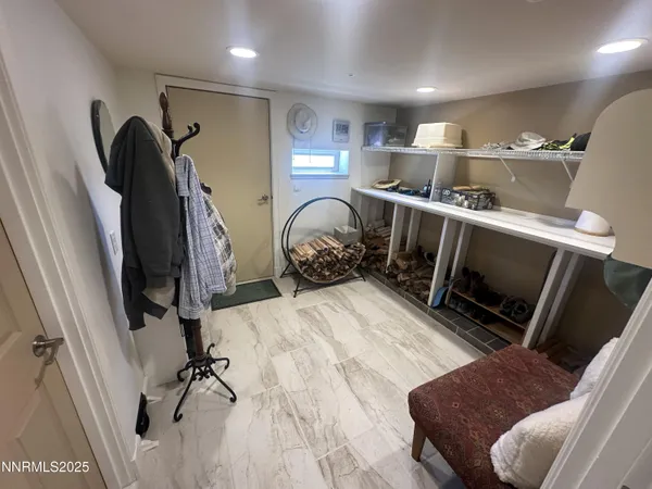a bathroom with a sink mirror vanity and toilet