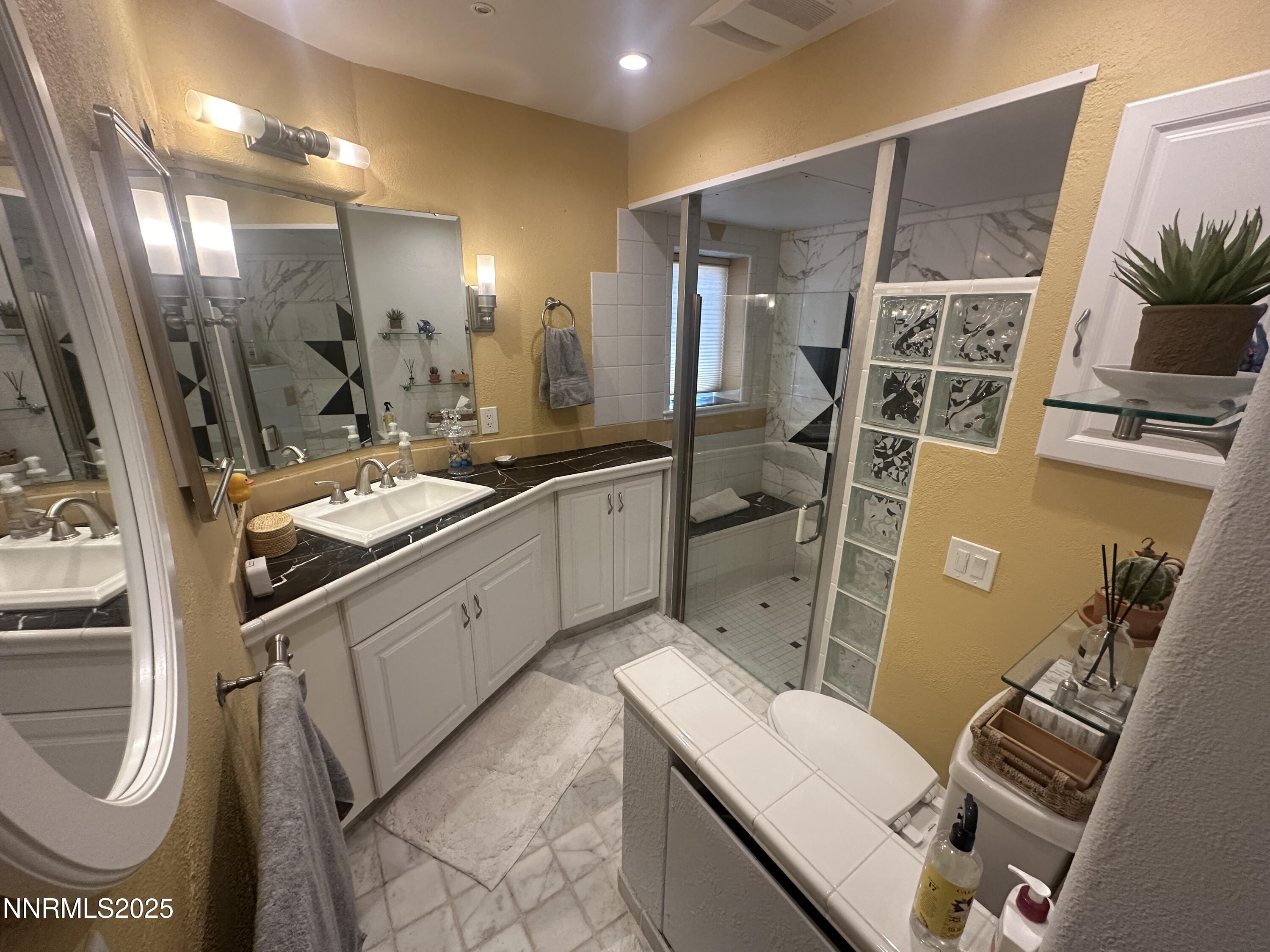 93205 State Route 34 Gerlach, NV 89412 - Photo 50 of 70 a bathroom with a sink a mirror and a shower