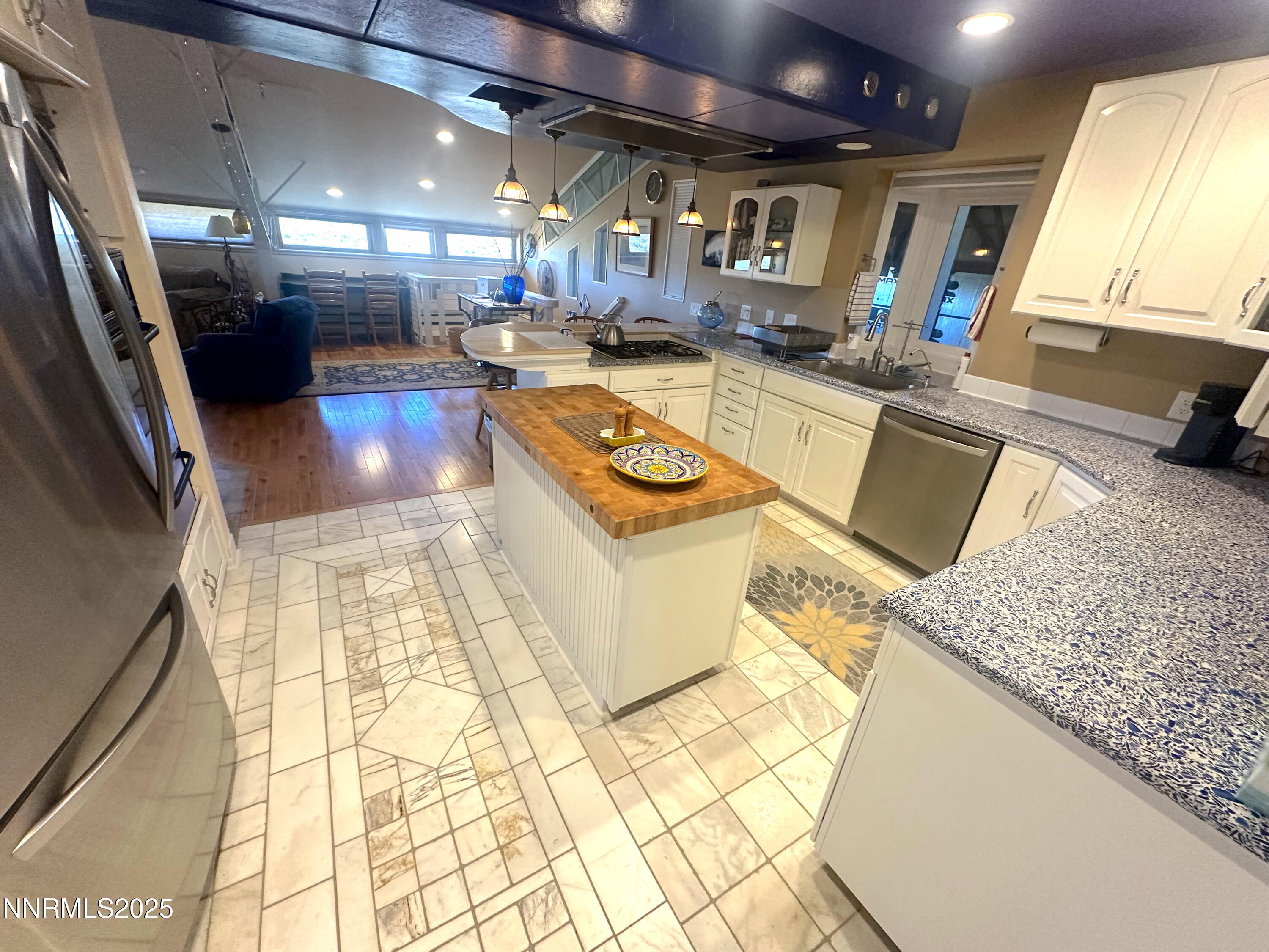 93205 State Route 34 Gerlach, NV 89412 - Photo 57 of 70 a kitchen with stainless steel appliances granite countertop a sink and a stove