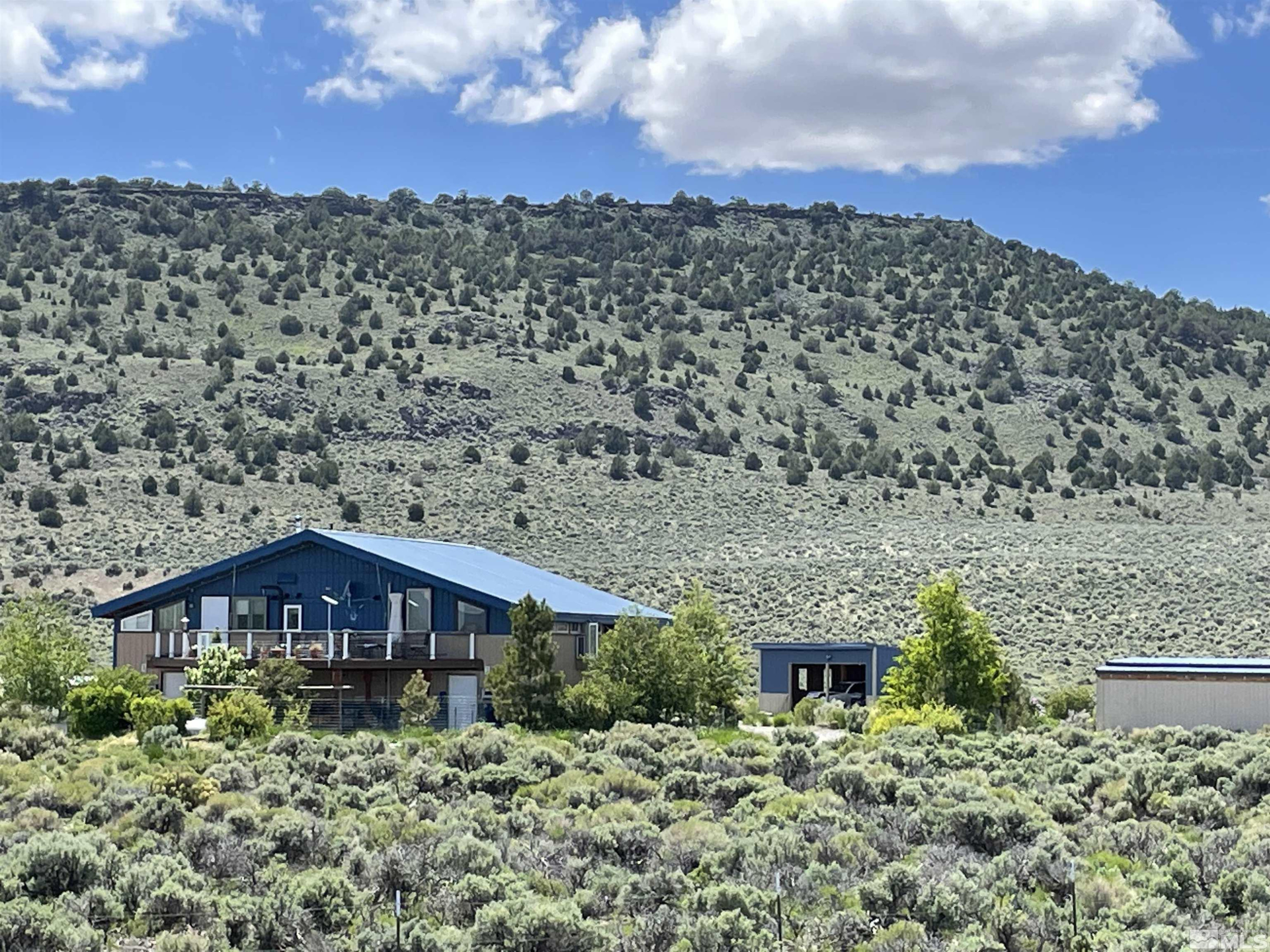 93205 State Route 34 Gerlach, NV 89412 - Photo 7 of 70 a view of a house with a yard