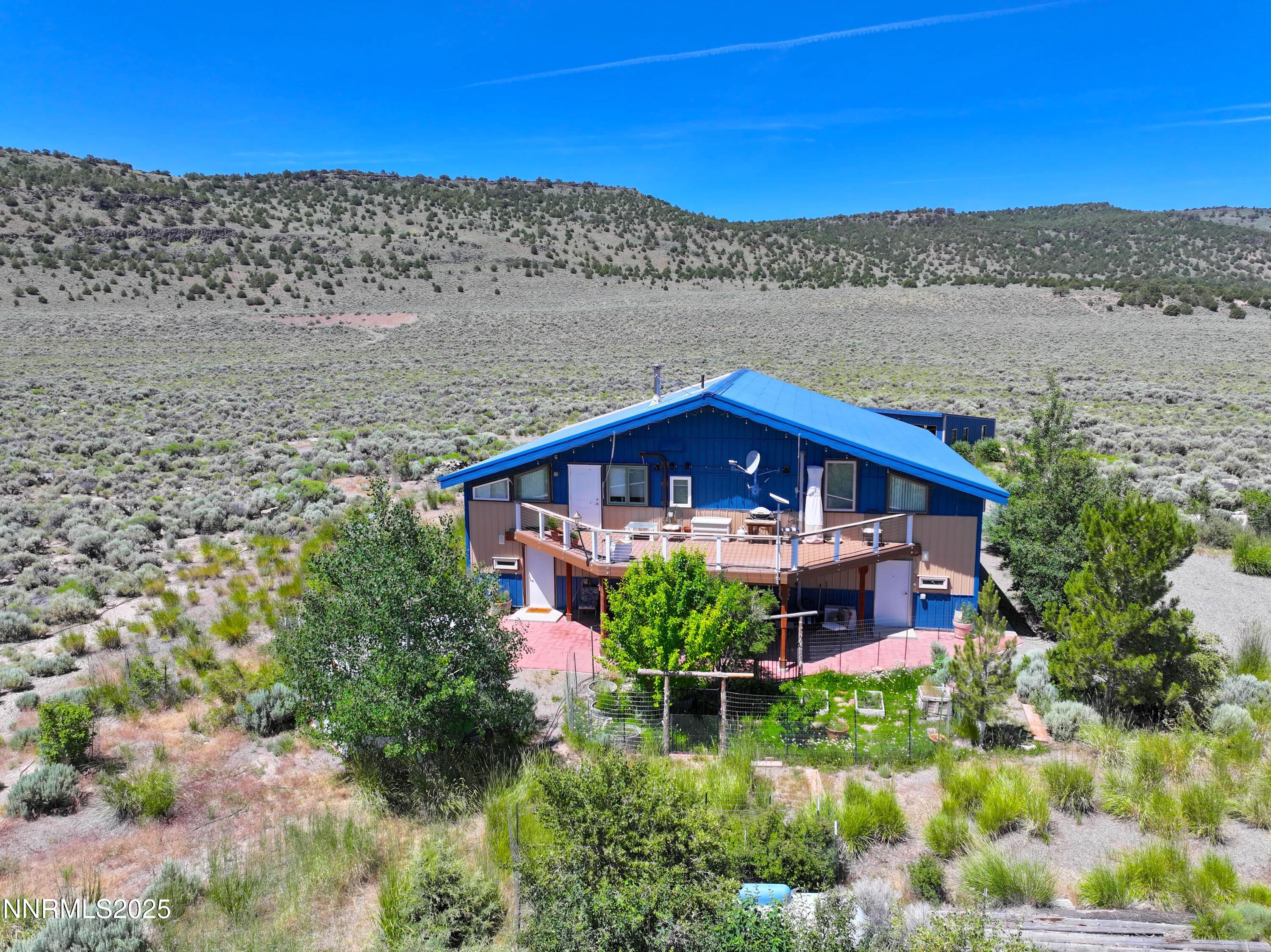 93205 State Route 34 Gerlach, NV 89412 - Photo 9 of 70 a front view of a house with a yard