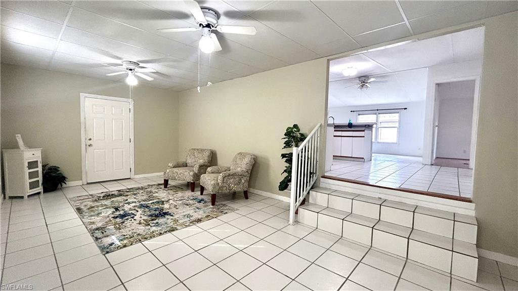 Undisclosed Address Naples, FL 34114 - Photo 2 of 20 a very nice looking room with a couch