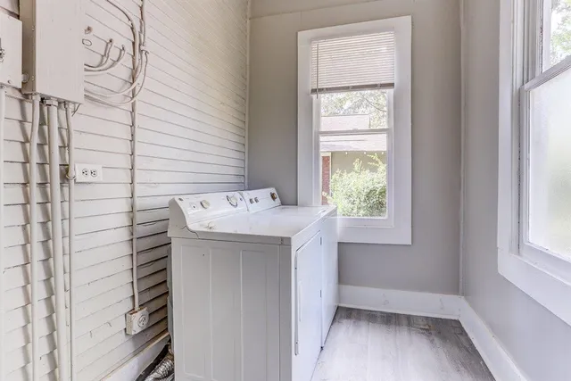 a bathroom with a sink and a window