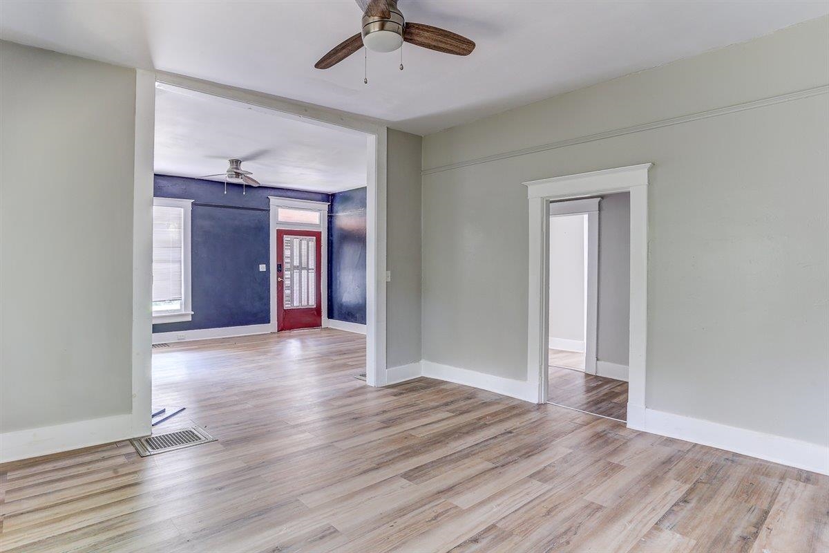2006 Felix Avenue Memphis, TN 38104 - Photo 18 of 37 wooden floor in an empty room with a window