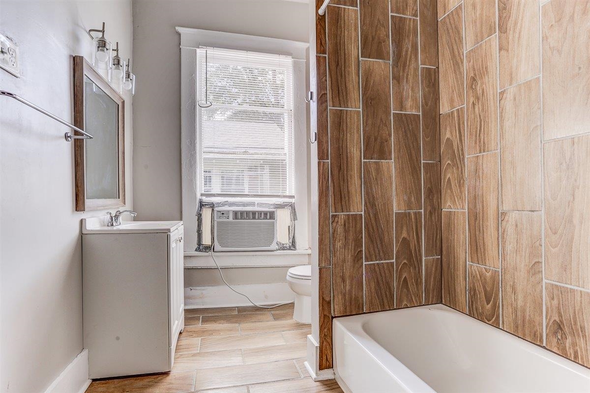 2006 Felix Avenue Memphis, TN 38104 - Photo 23 of 37 a bathroom with a tub shower and sink