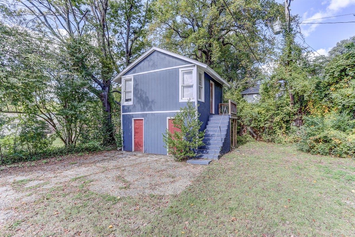 2006 Felix Avenue Memphis, TN 38104 - Photo 31 of 37 a front view of a house with a yard