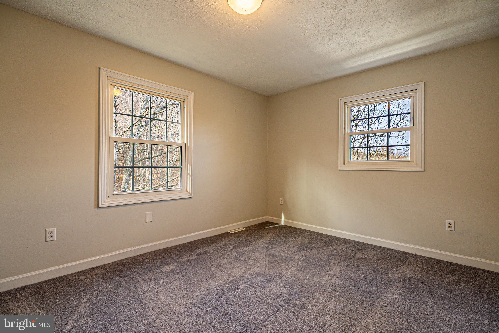 15117 Trail Ridge Road Southwest Cumberland, MD 21502 - Photo 24 of 43 an empty room with windows