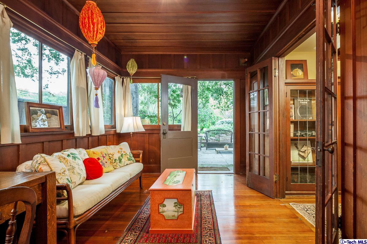 1255 Morada Place Altadena, CA 91001 - Photo 16 of 37 a living room with furniture a ceiling fan and a large window