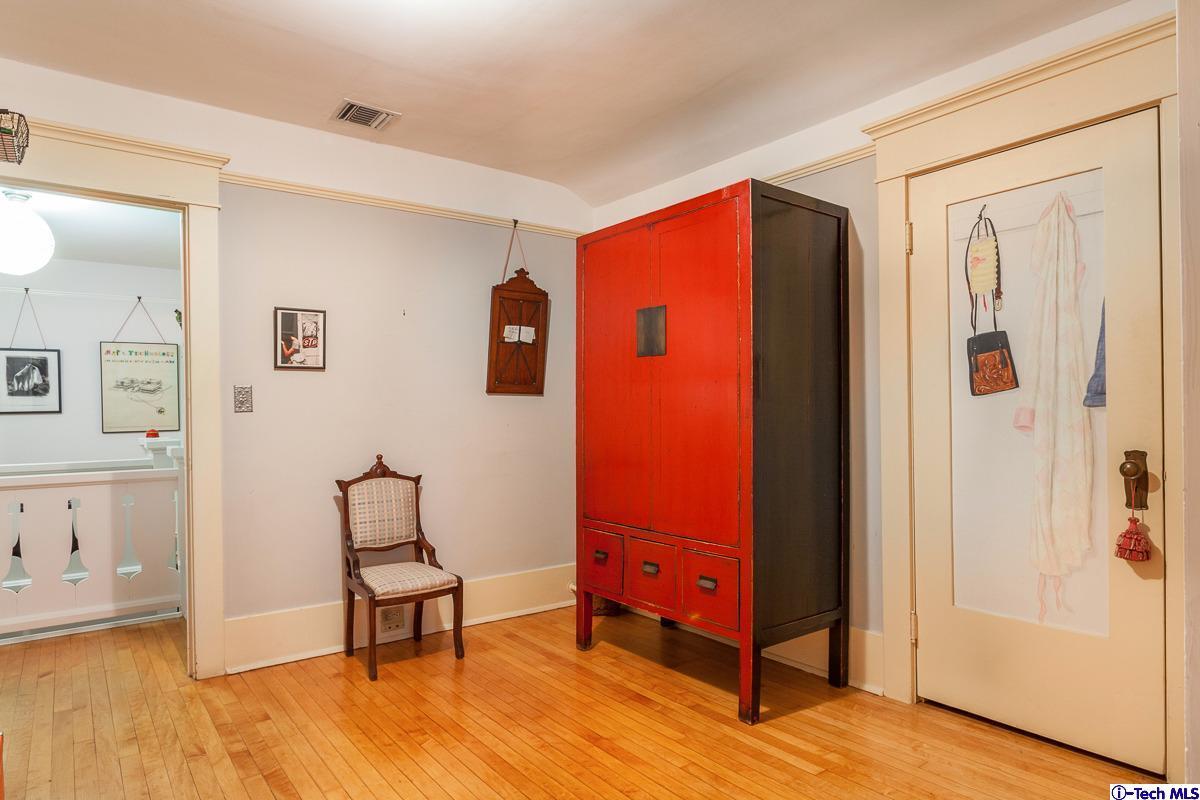 1255 Morada Place Altadena, CA 91001 - Photo 22 of 37 a view of a livingroom with furniture and wooden floor