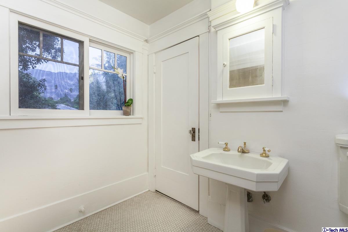 1255 Morada Place Altadena, CA 91001 - Photo 24 of 37 a white sink sitting next to a white sink