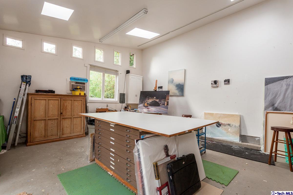 1255 Morada Place Altadena, CA 91001 - Photo 30 of 37 a kitchen with a sink a stove and a refrigerator