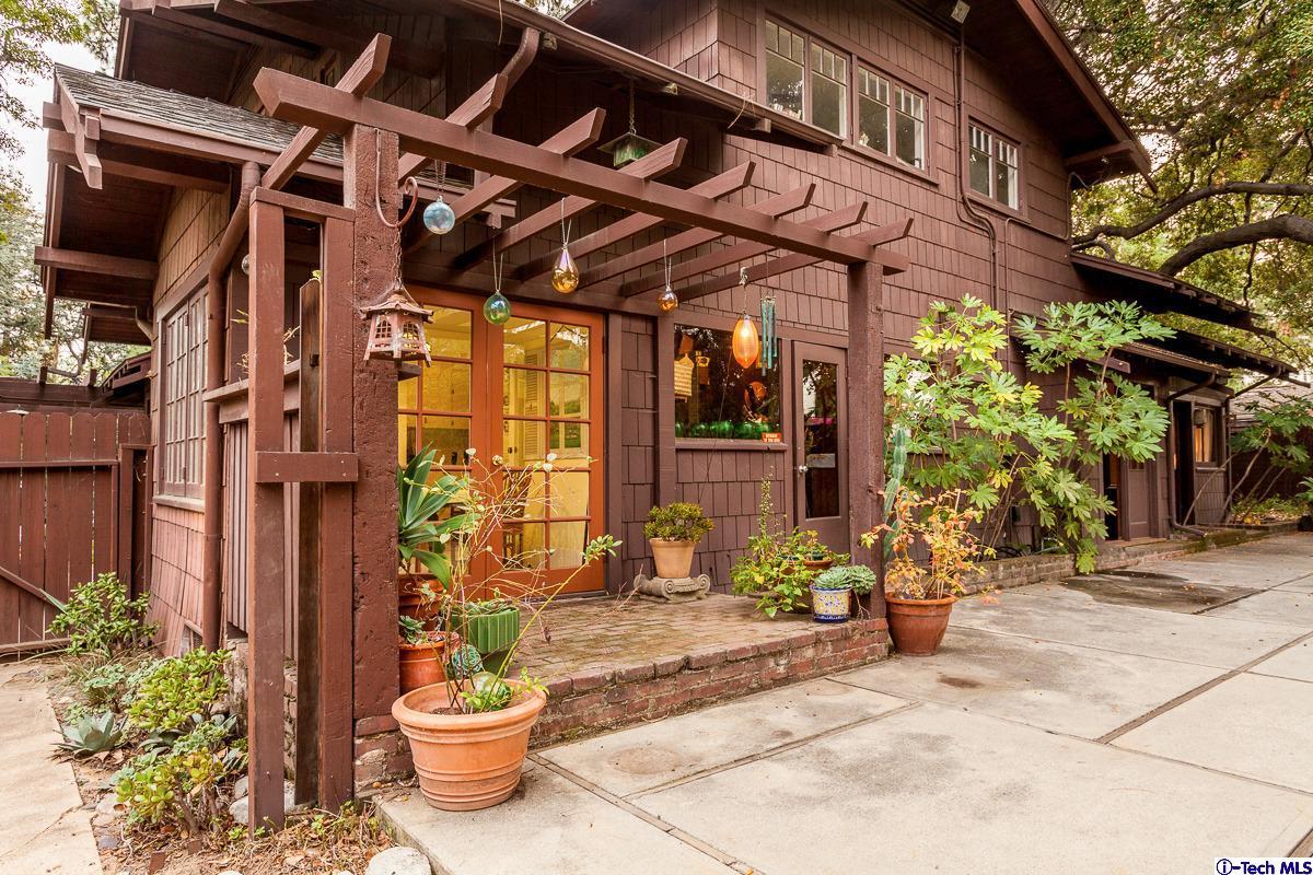 1255 Morada Place Altadena, CA 91001 - Photo 31 of 37 a view of a patio with a table and chairs and potted plants