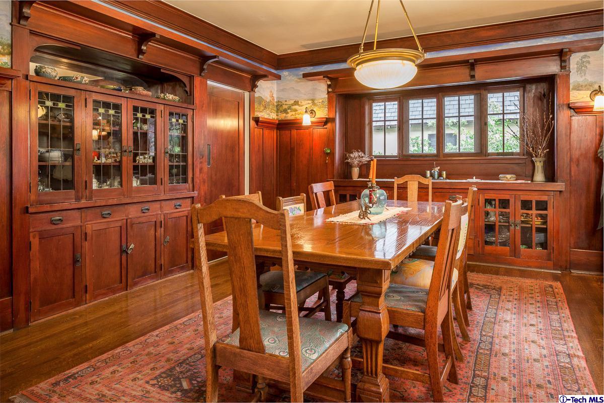 1255 Morada Place Altadena, CA 91001 - Photo 7 of 37 a dining room with furniture a chandelier and wooden floor