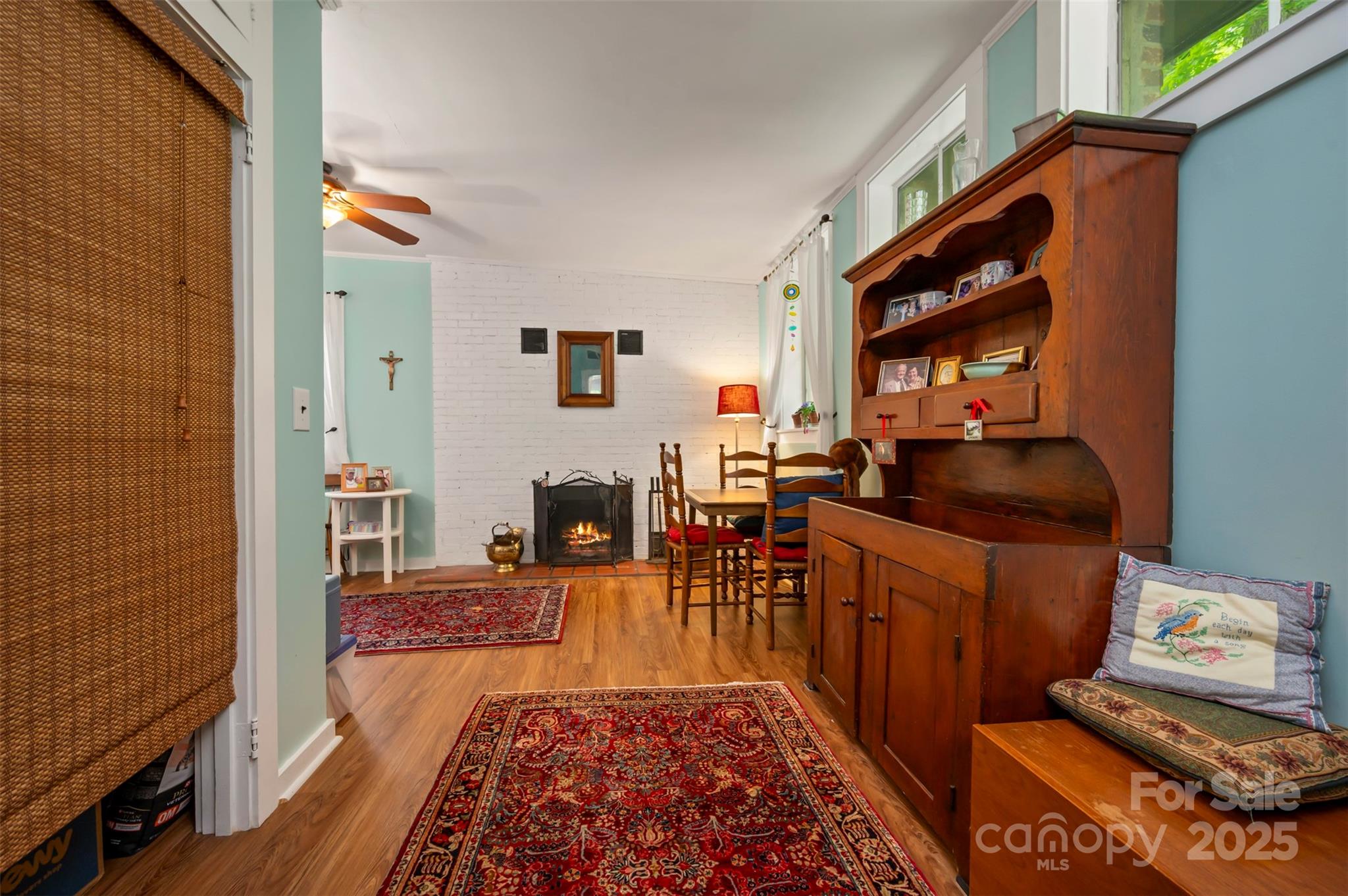 312 Page Farm Road Tryon, NC 28782 - Photo 21 of 44 a living room with furniture a rug and a fireplace